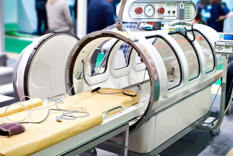 a Hyperbaric Oxygen Therapy Chamber with a bed